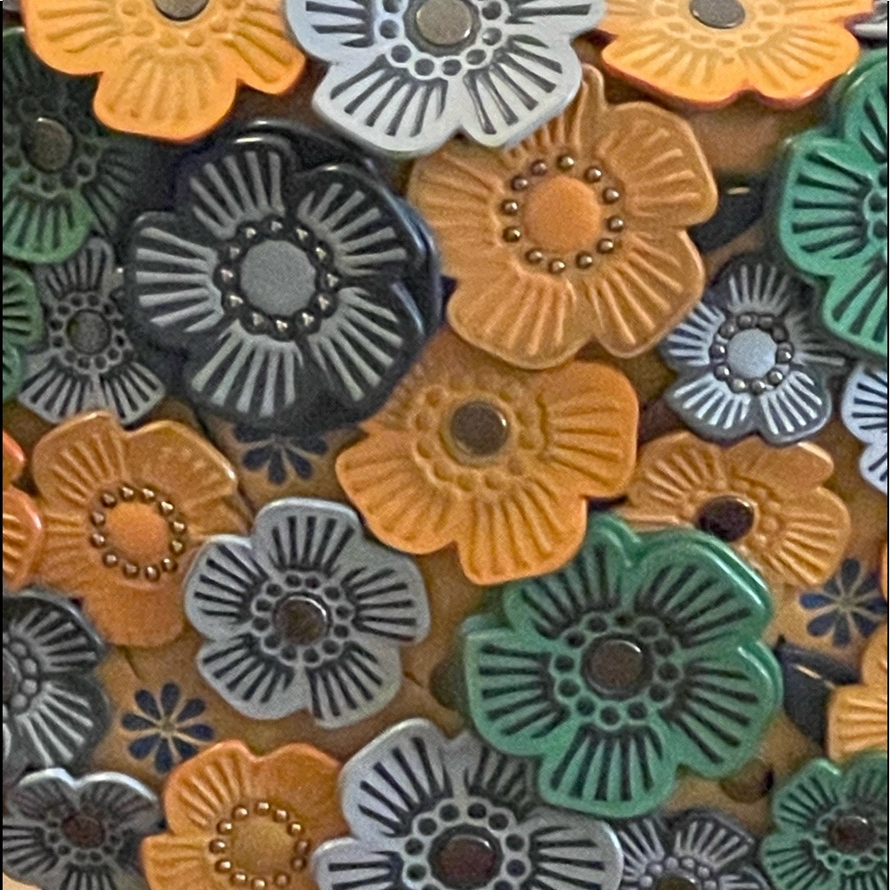 The OG Coach tea rose saddlebag.